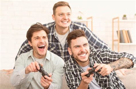 Avid Gamers Excited Men Playing Video Game Stock Image Image Of