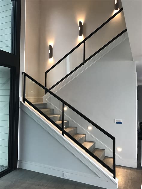 Scandinavian interior with an olympus bar railing by ags stainless Interior Glass Stair Railing • OT Glass