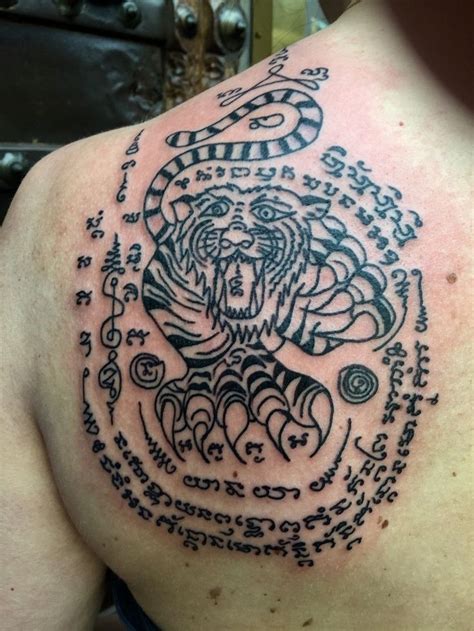 This is usually carried out by buddhist monks and accepted like holy ink to traditional muay thai fighters. Muay Thai Tattoo symbols and meanings | Thai tattoo, Thai ...