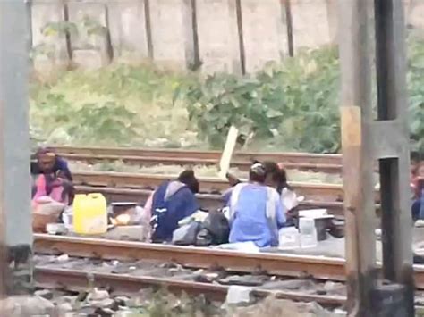 People Seen Cooking Food On Mumbai Local Train Tracks Video Goes Viral