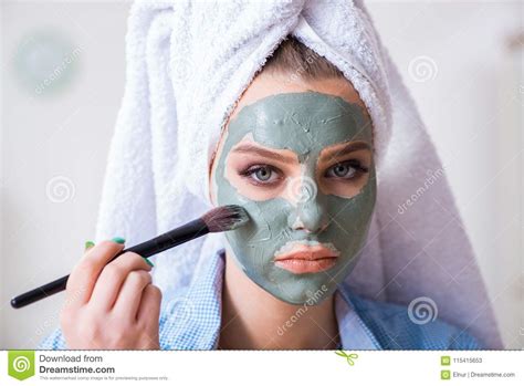 The Woman Applying Clay Mask With Brush At Home Stock Image Image Of