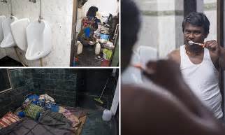delhi man who lives works and eats in a public toilet in india for £70 a month daily mail online