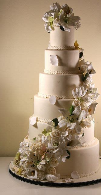 10 wedding guests = 6 inch wedding cake. 6 tier wedding cake with sugar flowers cascade | Wedding ...