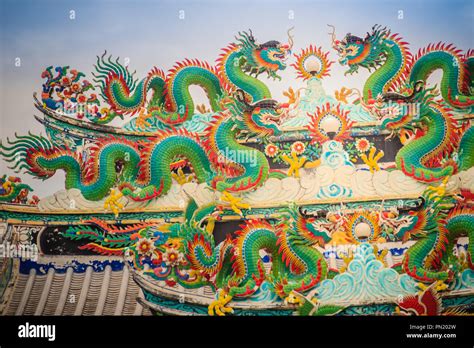 Colorful Chinese Dragon Statues On Roof In Chinese Temple Chinese