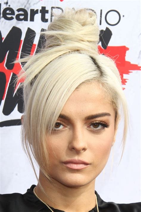 Bebe Rexha Straight Platinum Blonde Bun Sideswept Bangs Hairstyle