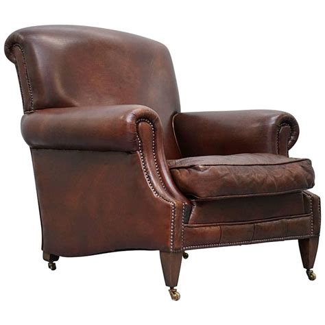 Dark brown tones and genuine leather upholstery make this club chair just right for your traditional living room, den, or study. RRP £5800 Custom-Made George Smith Club Armchair Aged ...