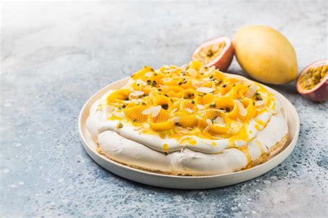 Pavlova, unlike other meringues, is made with vinegar and cornstarch, so the end result is crisp on the outside, but still has some tooth (chew) on the inside. Pavlova Meringue Cake With Blueberries, Strawberries ...