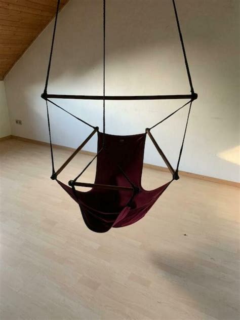 This comfortable hanging chair with footrest in vibrant color offers you great relaxation and makes an ideal addition to any outdoor vacation. Dark red hammock chair with footrest floating in my loft ...