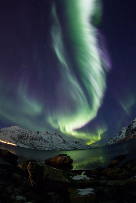 The Northern Lights Between The Norwegian Fjords Norway