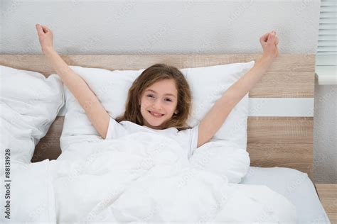 Girl Waking Up From Bed Stock Foto Adobe Stock