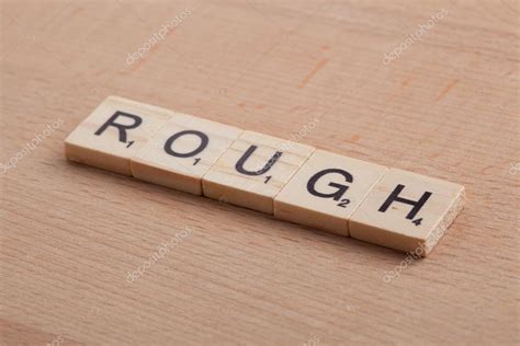 Scrabble Letters Spelling The Word Rough — Stock Photo © Halfbottle