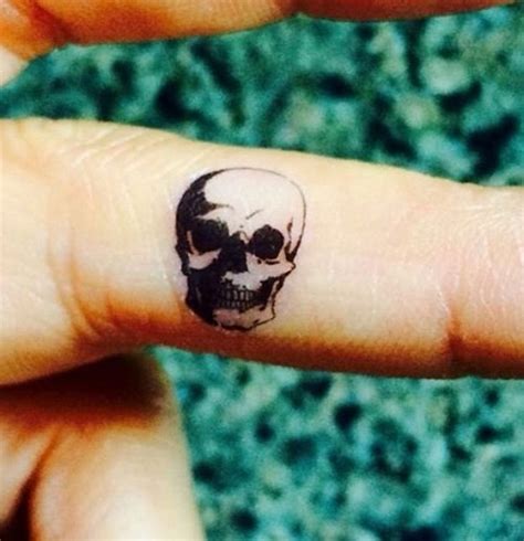 Skull Tattoo On Finger Designs Ideas And Meaning Tattoos For You
