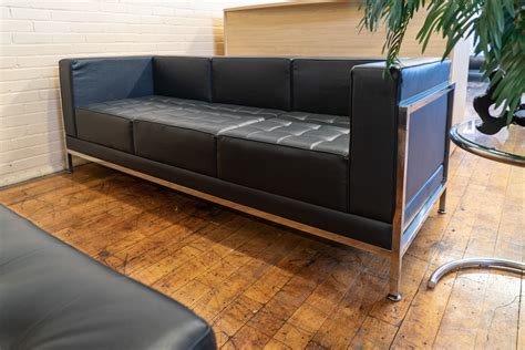 Mid Century Modern Black Leather Sofa • Peartree Office Furniture