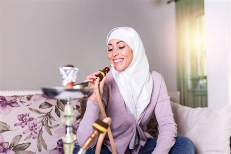Premium Photo Muslim Woman Smoking Shisha At Home Arab Girl Smoking