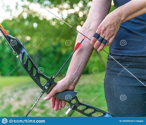 Archery Preparing To Shoot An Arrow From A Bow Stock Image Image Of