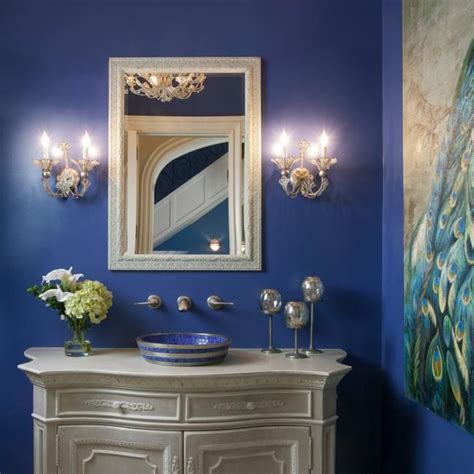 Bright Blue Traditional Powder Room With Gold Sconces Hgtv