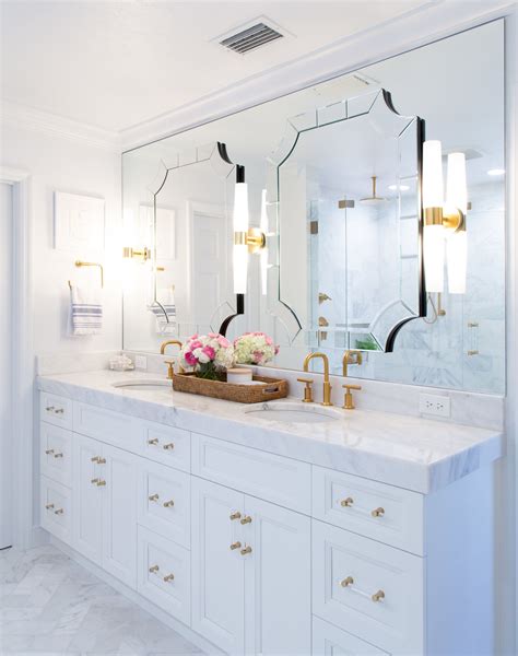 Full Mirror Wall Behind The Vanity With A Pair Of Mirrors Layered Over It Sconces In B Art