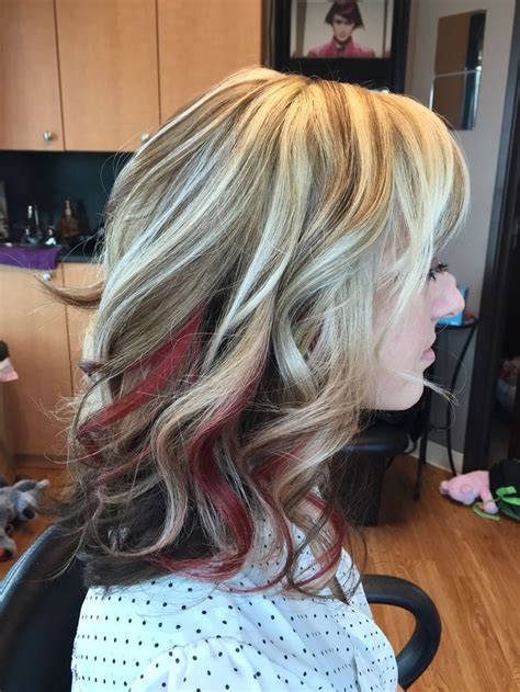 Red Hair With Blonde Underneath The Latest Trend In Hair Color