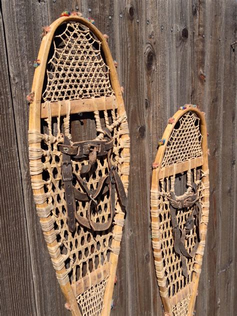 antique native american indian snowshoes multi colored pom poms vintagewinter
