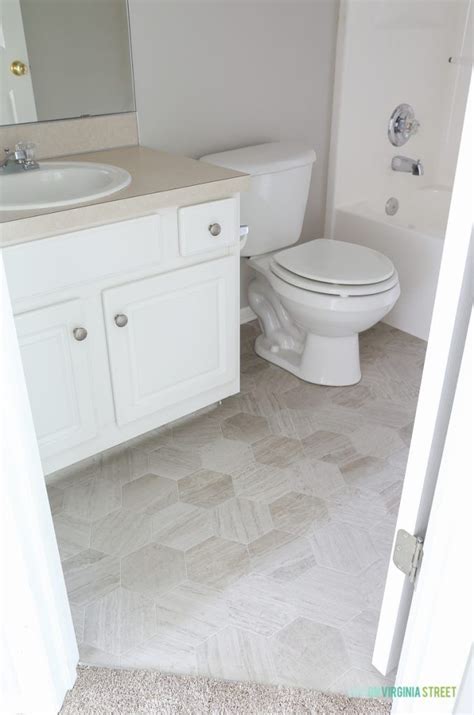 Our modern and retro vinyl flooring patterns are available at both our store and available to purchase online. The Rental House Reveal | Bathroom vinyl, Vinyl flooring ...