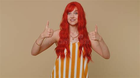 Redhead Ginger Stylish Woman Girl Showing Thumbs Up And Nodding In Approval Successful Good
