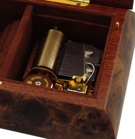 Reuge is known as a pioneer of the mechanical. Reuge Musical Jewellery Box in Burr Elm with Musical Inlay, Reuge 36 Note Music Boxes from N J ...
