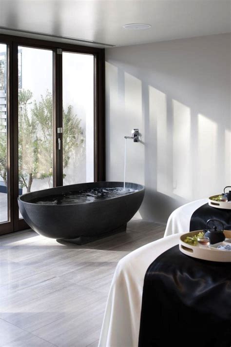 Discover inspiration for your minimalist bathroom remodel 30 astonishing black bathroom designs. Black Bath Tubs - An Elegant Statement - The Design Library