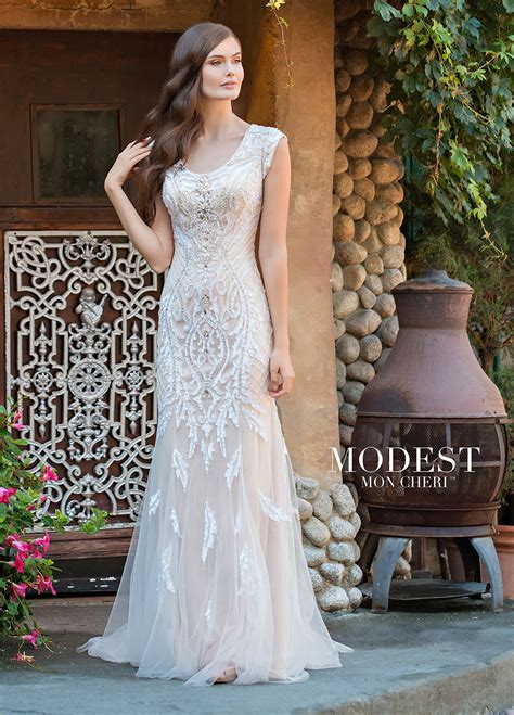 Modest Fit And Flare Wedding Dress With A Scoop Neckline And Cap Sleeves With Images Modest
