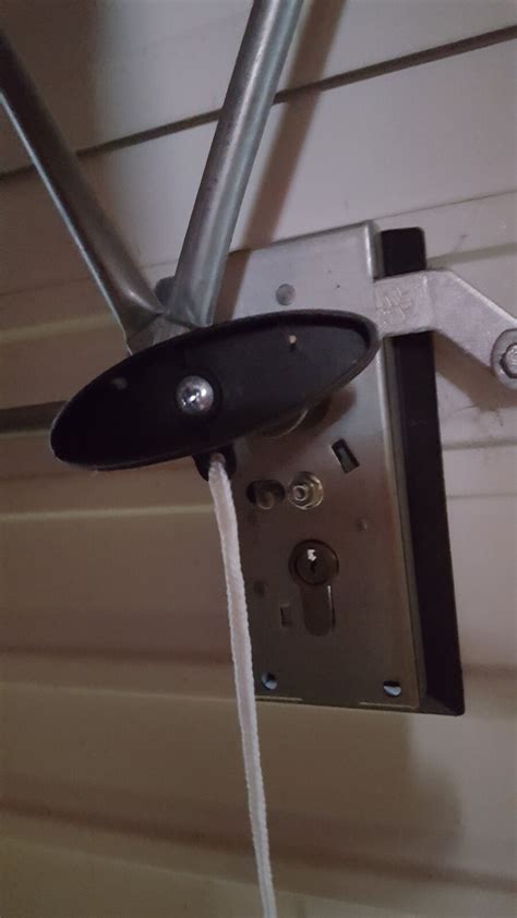 This means that you have to get out of the car when you get home, unlock the door and lift it yourself. Replacing locked garage door lock without key. | DIYnot Forums