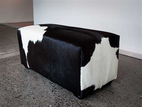 This Deep Black And White Cowhide Ottoman Is Perfect For A Walk In