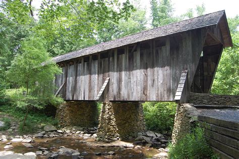 The covered bridge the maitlands drive off was just a normal bridge in real life, the covering was built for the movie. Pisgah Covered Bridge - Wikipedia
