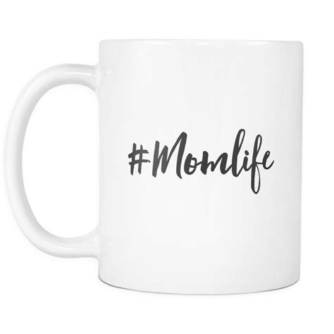 A White Coffee Mug With The Wordmomlifeprinted In Black On It