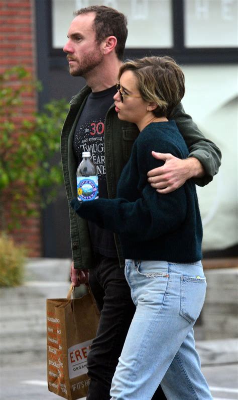 Emilia looked smitten as she went in for a big kiss with her new boyfriend. Emilia Clarke and her new boyfriend Charlie McDowell out ...