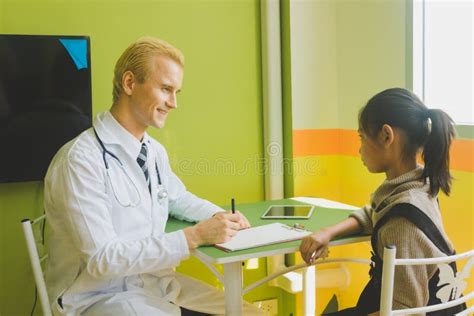 Doctor Examining The Patient Kid Stock Image Image Of Pediatrician