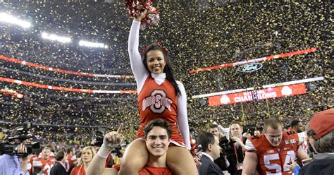 Football quickly became as popular 2) as other games such as cricket. Oregon, Ohio State cheerleaders at national championship game