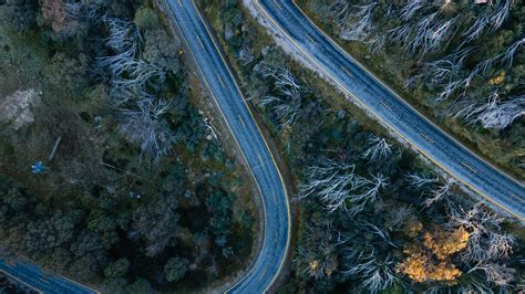 Download Wallpaper 3840x2160 Road Bends Trees Forest Aerial View 4k
