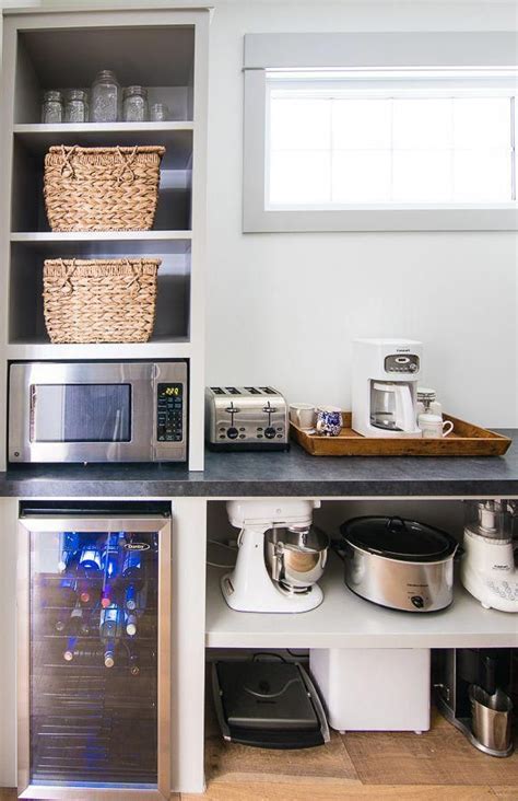 A popular butler's pantry design utilizes white cabinets for lower storage and a natural wood open shelf configuration instead of upper cabinets. Pantry Kitchen Storage Ideas | Butler pantry, Large pantry