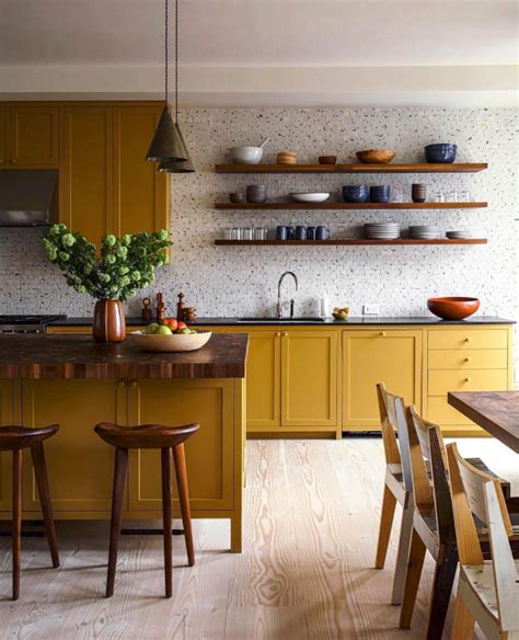 I receive numerous comments from my readers (you!) often asking what color to paint cabinets or what wall colors to use with their stained. Decorating with Mustard Yellow - Hey, Djangles.