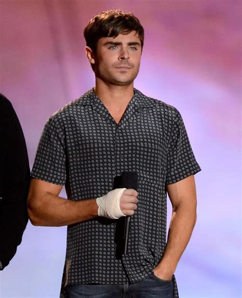 Zac Efron Opens Up About Mystery Hand Injury Daily Dish
