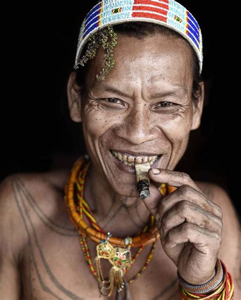 Portrait Of Mentawai Tribe Sikerei Taken In His Traditional House In