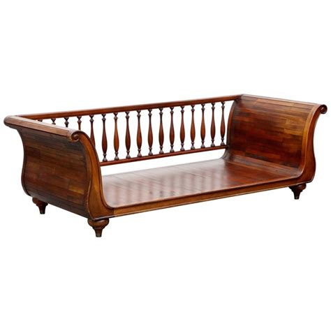 These have scrolled head and footboards made from heavy wood. Henredon Sleigh Daybed or Sofa with Spindle Back and ...