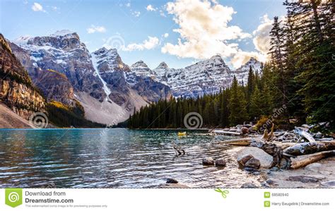 Moraine Lake And The Surrounding Snow Capped Mountains Stock Photo