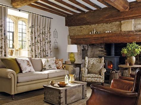 A Welcoming Country Cottage Sitting Room With Old Beams And Wood