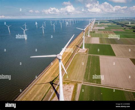 Windmill Park Westermeerdijk Netherlands Wind Mill Turbine With Blue