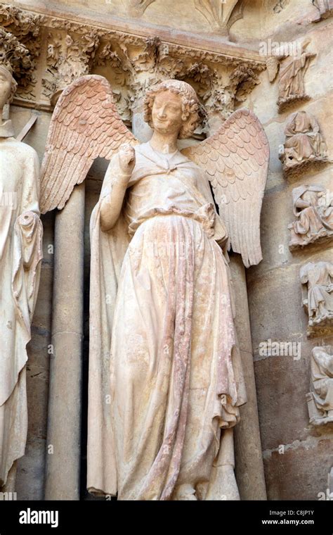 The Famous Smiling Angel Statue On Reims Cathedral In France Stock