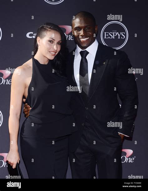 nfl player reggie bush and his girlfriend lilit avagyan attend the 2013 espy awards at the nokia
