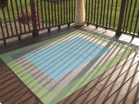 The deck boards made painting stripes a cinch! View From My Front Porch: Spray Painted Rug