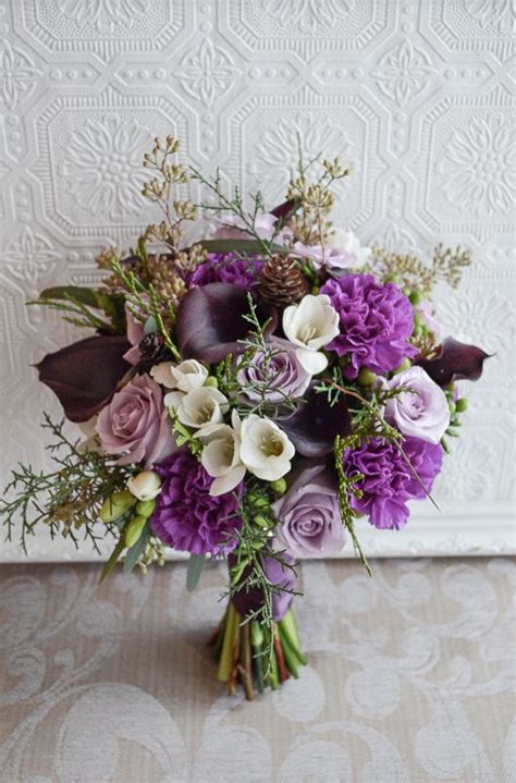 Offering a wide variety of designs including elegant, modern, rustic, traditional, dramatic & romantic. Wispy winter wedding bouquet of mini eggplant calla lilies ...