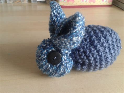 Start with some lion brand organic cotton. my first knitted rabbit made from a single knitted square ...