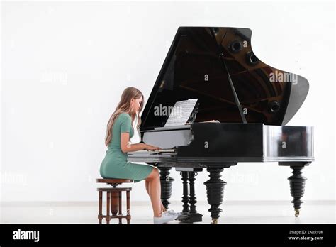 Young Woman Playing Grand Piano At The Concert Stock Photo Alamy